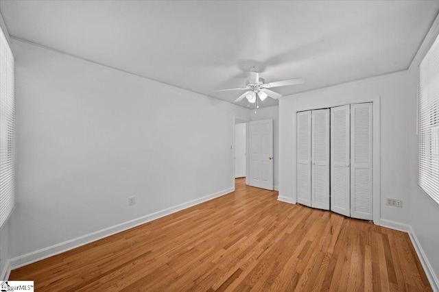 304 Robin Hood Rd, Greenville, SC 29607 - unfurnished bedroom with light wood finished floors, baseboards, a closet, and ceiling fan