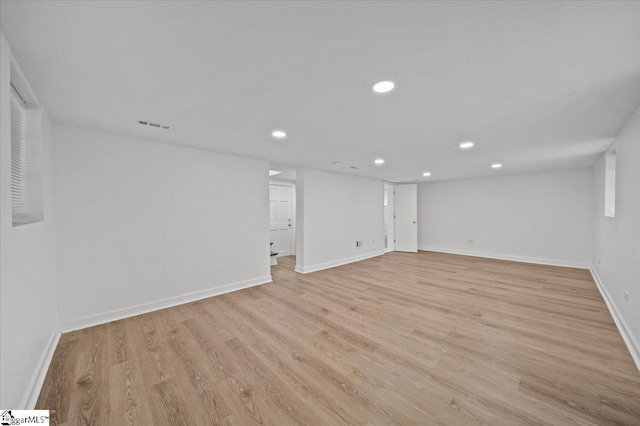304 Robin Hood Rd, Greenville, SC 29607 - finished basement featuring recessed lighting, light wood-type flooring, and baseboards