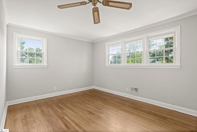 106 Chesterfield Rd, Greenville, SC 29605 - spare room featuring baseboards, wood finished floors, crown molding, and a ceiling fan
