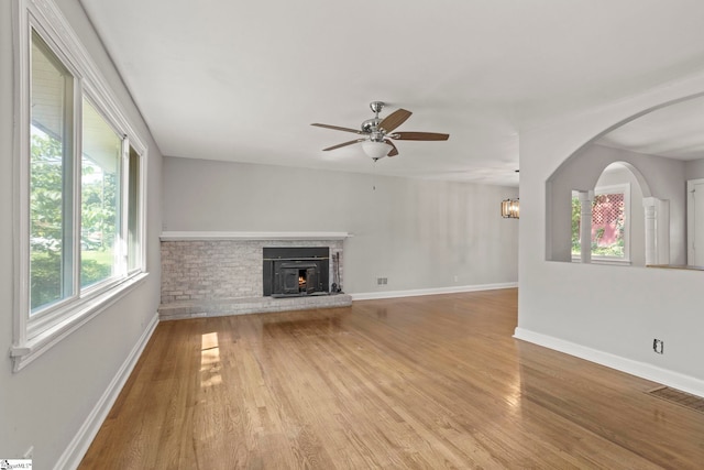 106 Chesterfield Rd, Greenville, SC 29605 - unfurnished living room with plenty of natural light, ceiling fan, light wood-style floors, and baseboards
