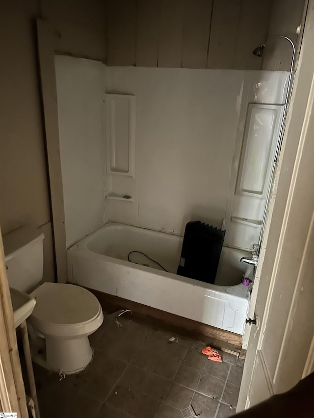304 Jones St, Laurens, SC 29360 - bathroom with toilet, tile patterned flooring, and washtub / shower combination