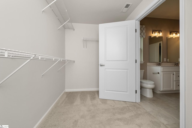 6010 Ives Ave, Spartanburg, SC 29307 - spacious closet featuring light colored carpet and a sink