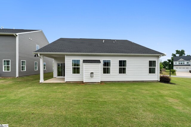 6010 Ives Ave, Spartanburg, SC 29307 - rear view of house featuring a patio and a lawn
