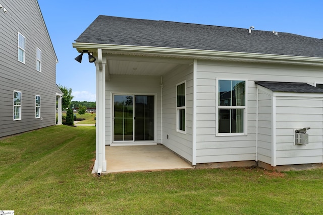 6010 Ives Ave, Spartanburg, SC 29307 - back of property featuring a patio area, a shingled roof, and a yard