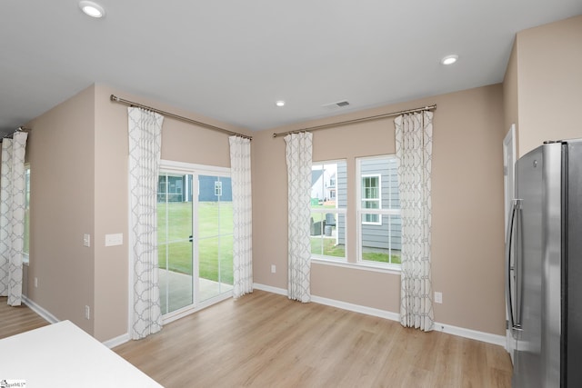 6010 Ives Ave, Spartanburg, SC 29307 - unfurnished dining area featuring light wood-type flooring, baseboards, and recessed lighting