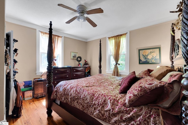 127 Orr St, Piedmont, SC 29673 - bedroom with wood finished floors, ceiling fan, and crown molding