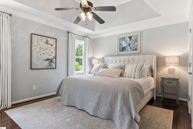 435 Grayson Dr, Moore, SC 29369 - bedroom featuring a raised ceiling, dark wood-style floors, baseboards, crown molding, and ceiling fan