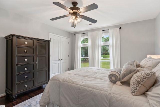 435 Grayson Dr, Moore, SC 29369 - bedroom with dark wood-type flooring, a closet, ceiling fan, and baseboards