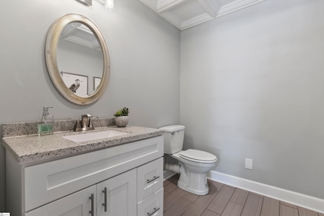 435 Grayson Dr, Moore, SC 29369 - bathroom featuring baseboards, toilet, vanity, crown molding, and wood finished floors