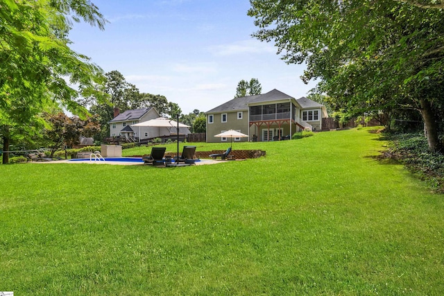 435 Grayson Dr, Moore, SC 29369 - view of yard featuring a sunroom, an outdoor pool, and a patio