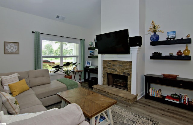 1608 Rock Springs Rd, Lavonia, GA 30553 - living area with wood finished floors and a fireplace