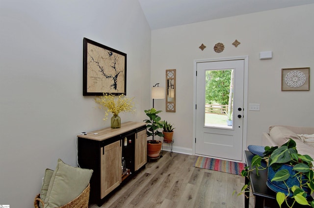 1608 Rock Springs Rd, Lavonia, GA 30553 - entryway with light wood finished floors, lofted ceiling, and baseboards