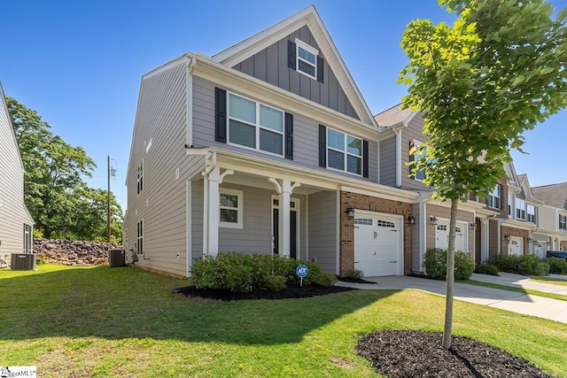 106 Cross Arbor Dr, Simpsonville, SC 29681 - townhome / multi-family property with board and batten siding, a garage, concrete driveway, and a front yard