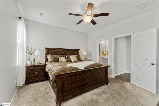 106 Cross Arbor Dr, Simpsonville, SC 29681 - bedroom with light carpet, baseboards, a ceiling fan, and connected bathroom