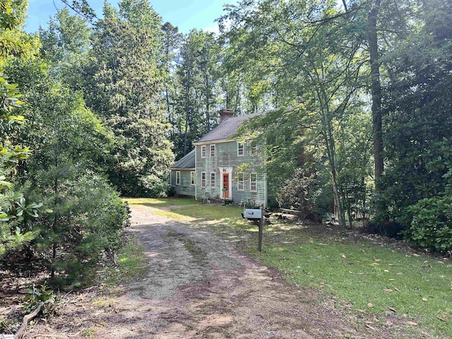 141 Shoreham Rd, Spartanburg, SC 29307 - view of front of home featuring driveway and a chimney