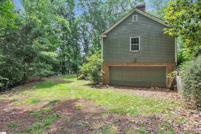 141 Shoreham Rd, Spartanburg, SC 29307 - view of side of home featuring brick siding, a chimney, and a yard