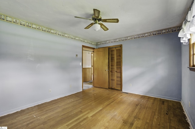 367 Janulis St, Spartanburg, SC 29301 - spare room featuring baseboards, wood finished floors, and ceiling fan