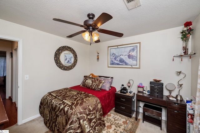 10 Sunset Mountain Ct, Travelers Rest, SC 29690 - bedroom featuring light colored carpet, ceiling fan, an office area, a textured ceiling, and baseboards