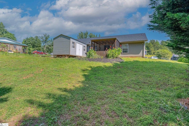 10 Sunset Mountain Ct, Travelers Rest, SC 29690 - rear view of house with a sunroom and a yard