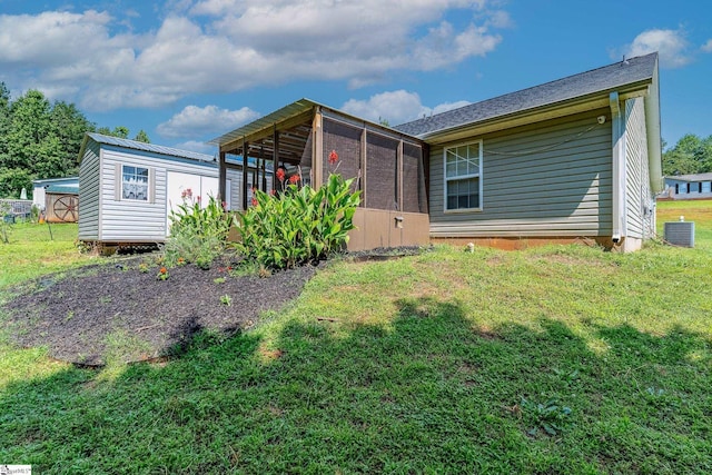 10 Sunset Mountain Ct, Travelers Rest, SC 29690 - rear view of property featuring central AC unit, a sunroom, and a yard