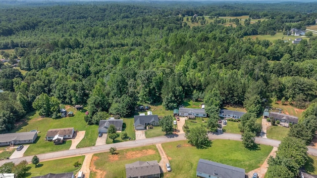 10 Sunset Mountain Ct, Travelers Rest, SC 29690 - aerial view of property and surrounding area featuring a heavily wooded area and nearby suburban area