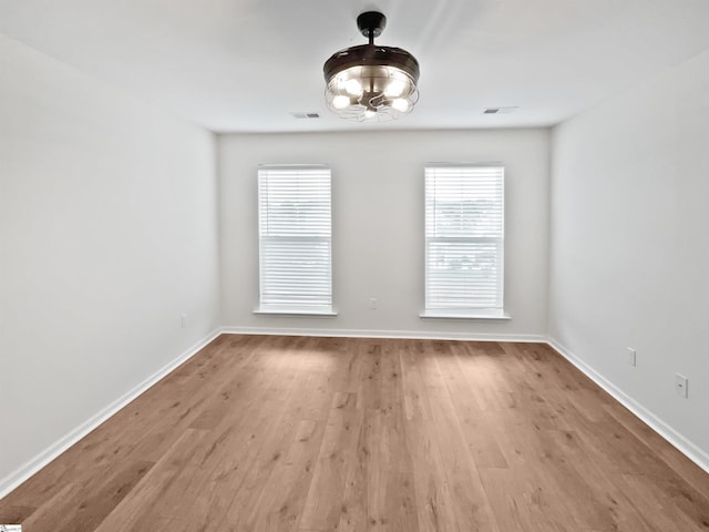26 Jannison Rd, Boiling Springs, SC 29316 - empty room with wood finished floors, healthy amount of natural light, and baseboards