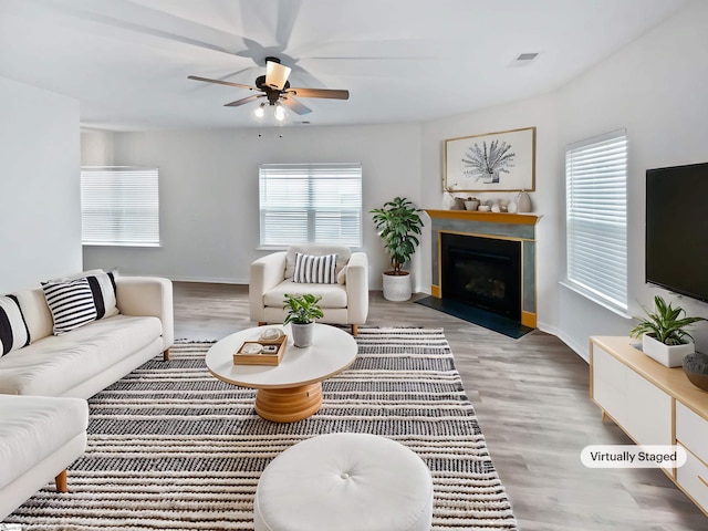 26 Jannison Rd, Boiling Springs, SC 29316 - living area featuring ceiling fan, healthy amount of natural light, wood finished floors, and baseboards