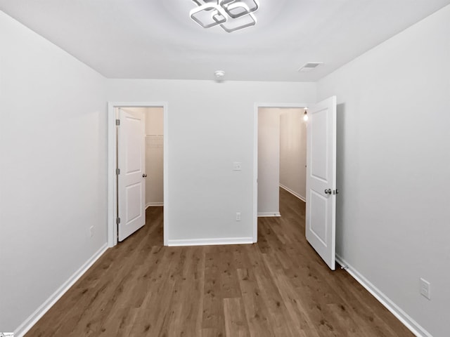 26 Jannison Rd, Boiling Springs, SC 29316 - unfurnished bedroom with wood finished floors, baseboards, and a spacious closet