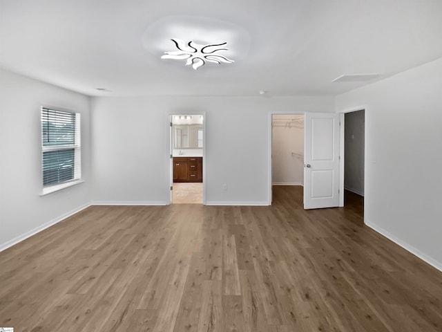 26 Jannison Rd, Boiling Springs, SC 29316 - unfurnished living room featuring wood finished floors and baseboards