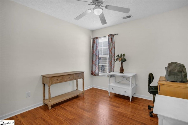 104 Pin Oak Dr, Greenwood, SC 29649 - office with wood finished floors, a ceiling fan, baseboards, and a textured ceiling