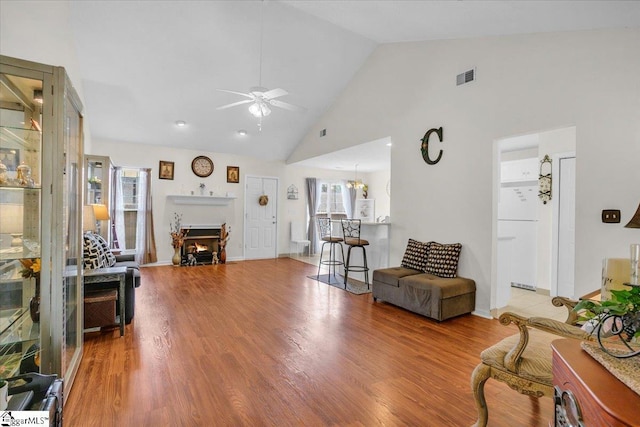 104 Pin Oak Dr, Greenwood, SC 29649 - living area with a ceiling fan, high vaulted ceiling, plenty of natural light, and wood finished floors