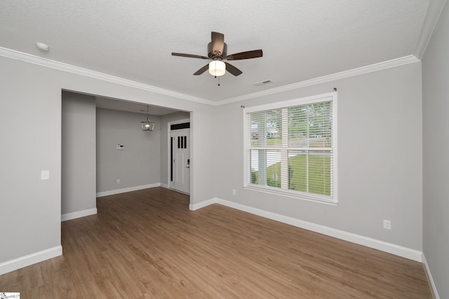 100 Holly Dr, Duncan, SC 29334 - spare room with ceiling fan, wood finished floors, baseboards, crown molding, and a textured ceiling
