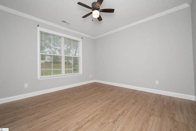 100 Holly Dr, Duncan, SC 29334 - unfurnished room featuring crown molding, baseboards, light wood-style flooring, and ceiling fan