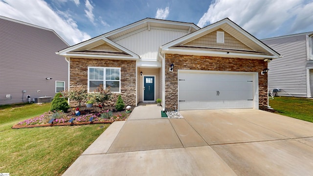 931 Brynderwen Pl, Lyman, SC 29365 - craftsman inspired home featuring stone siding, concrete driveway, a front lawn, board and batten siding, and an attached garage