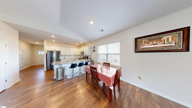931 Brynderwen Pl, Lyman, SC 29365 - dining space with wood finished floors, lofted ceiling, baseboards, and recessed lighting