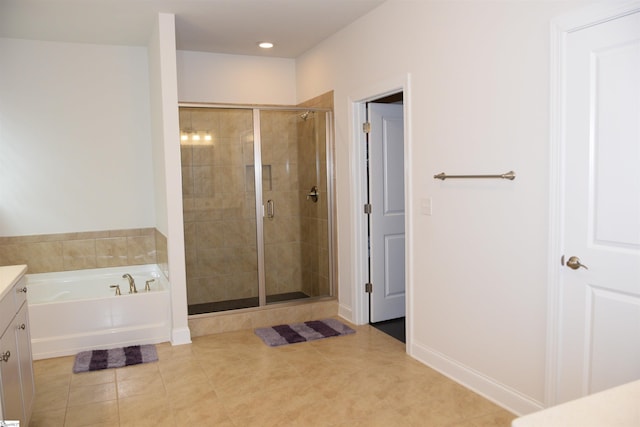127 Riverland Woods Ct, Simpsonville, SC 29681 - full bath with a stall shower, tile patterned floors, vanity, a bath, and recessed lighting