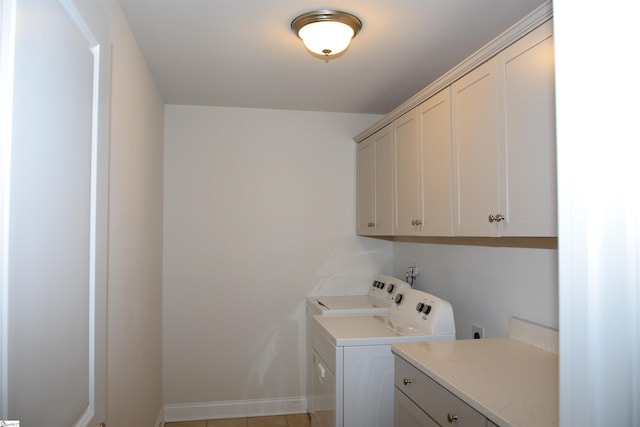 127 Riverland Woods Ct, Simpsonville, SC 29681 - laundry area with cabinet space, separate washer and dryer, and baseboards