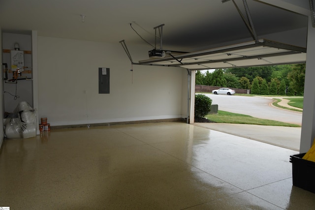 127 Riverland Woods Ct, Simpsonville, SC 29681 - garage with electric panel, a garage door opener, and baseboards