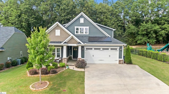 500 Briar Oaks Ln, Simpsonville, SC 29681 - craftsman inspired home featuring driveway, central AC unit, stone siding, a porch, and an attached garage