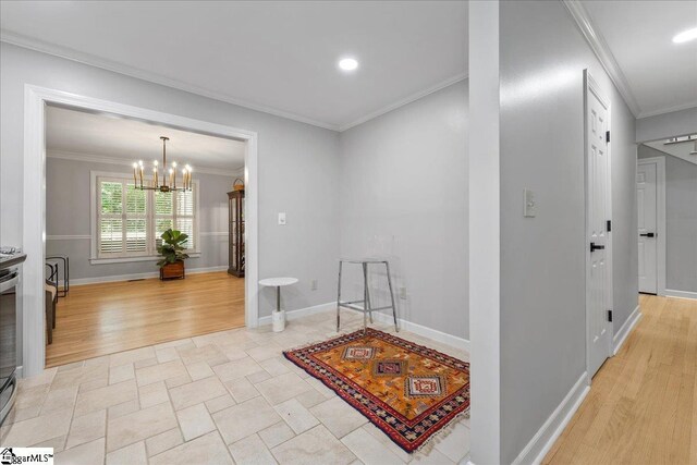 1250 Shadow Way, Greenville, SC 29615 - corridor with crown molding, a chandelier, recessed lighting, light wood-style floors, and baseboards