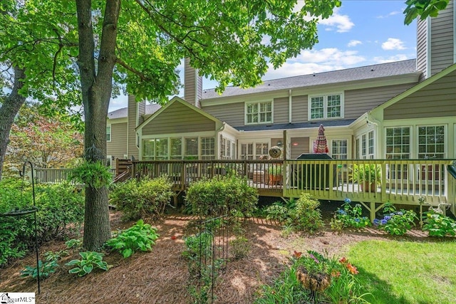 1250 Shadow Way, Greenville, SC 29615 - back of house featuring a wooden deck and a chimney