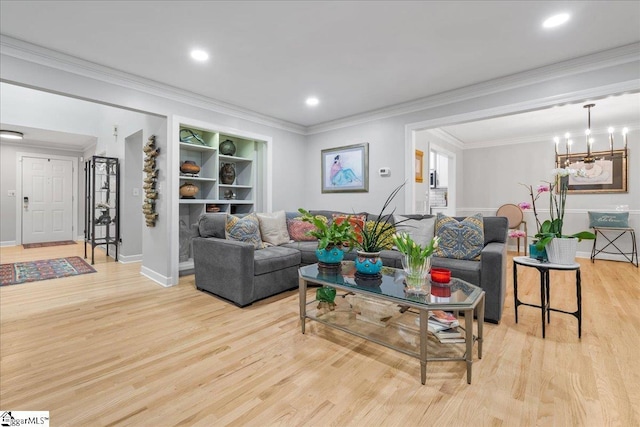1250 Shadow Way, Greenville, SC 29615 - living area with light wood-style floors, crown molding, recessed lighting, baseboards, and a chandelier