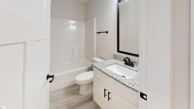 3834 Maid Marion Ln, Spartanburg, SC 29302 - bathroom featuring toilet, vanity, wood finished floors, and shower / tub combination