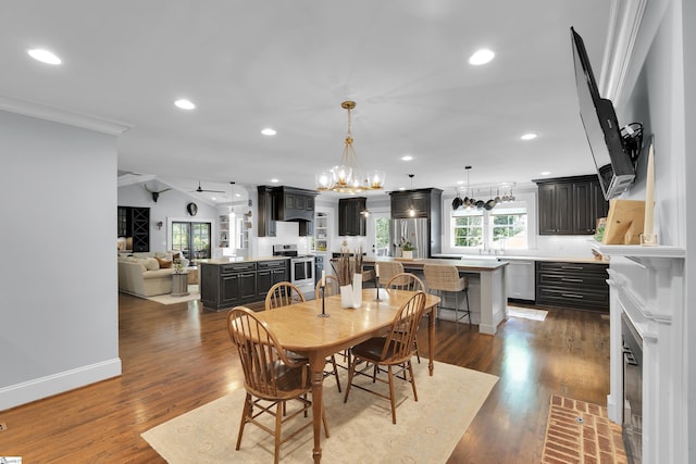 15 High Hill St, Greenville, SC 29605 - dining area featuring ornamental molding, a chandelier, recessed lighting, dark wood-style floors, and lofted ceiling
