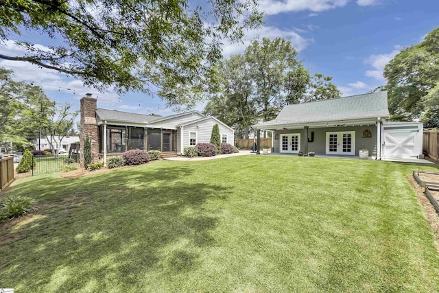 15 High Hill St, Greenville, SC 29605 - rear view of property with french doors, a chimney, and a sunroom