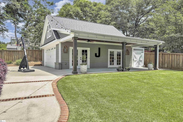 15 High Hill St, Greenville, SC 29605 - rear view of house featuring french doors, concrete driveway, and roof with shingles