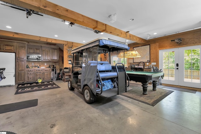 15 High Hill St, Greenville, SC 29605 - garage featuring french doors, freestanding refrigerator, and recessed lighting