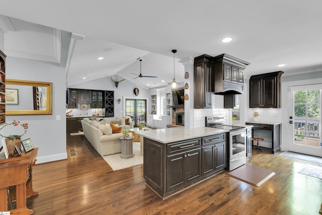 15 High Hill St, Greenville, SC 29605 - kitchen featuring electric stove, ceiling fan, wood finished floors, a brick fireplace, and decorative backsplash