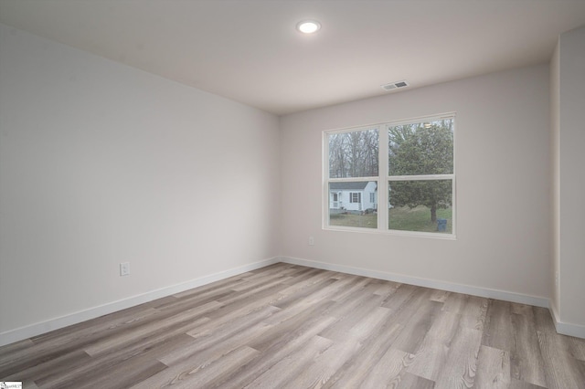 3838 Maid Marion Ln, Spartanburg, SC 29302 - empty room with light wood-style floors, baseboards, and recessed lighting