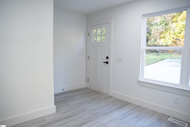 3838 Maid Marion Ln, Spartanburg, SC 29302 - entryway featuring baseboards and light wood finished floors